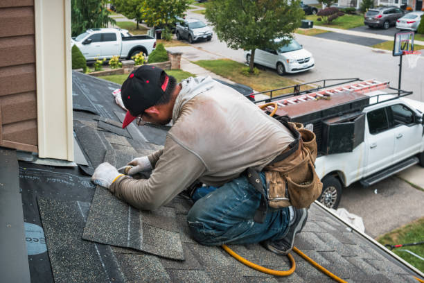 Professional Roofing technician working in Adamsville, RI